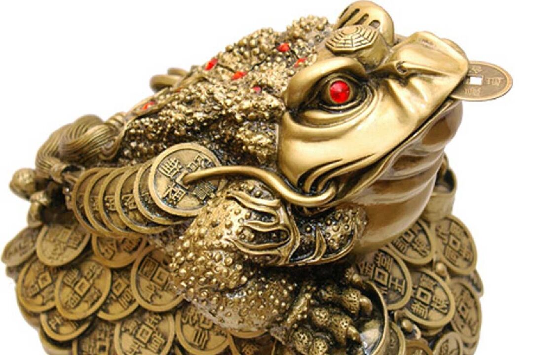 Money frog with ancient Chinese coins - talisman for wealth