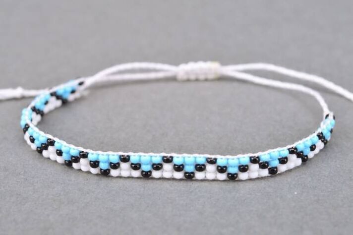 Bracelets made of thread and beads are a talisman that will bring good luck to its owner